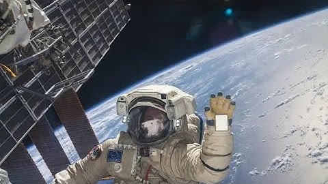 ISS solar array unfurl during spacewalk helmet cam view