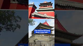 Shocking moment tiles fall from China's famous Drum Tower