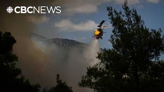 Two helicopters collide near Athens as Greece battles wildfires, killing 2 crew members @CBCNews