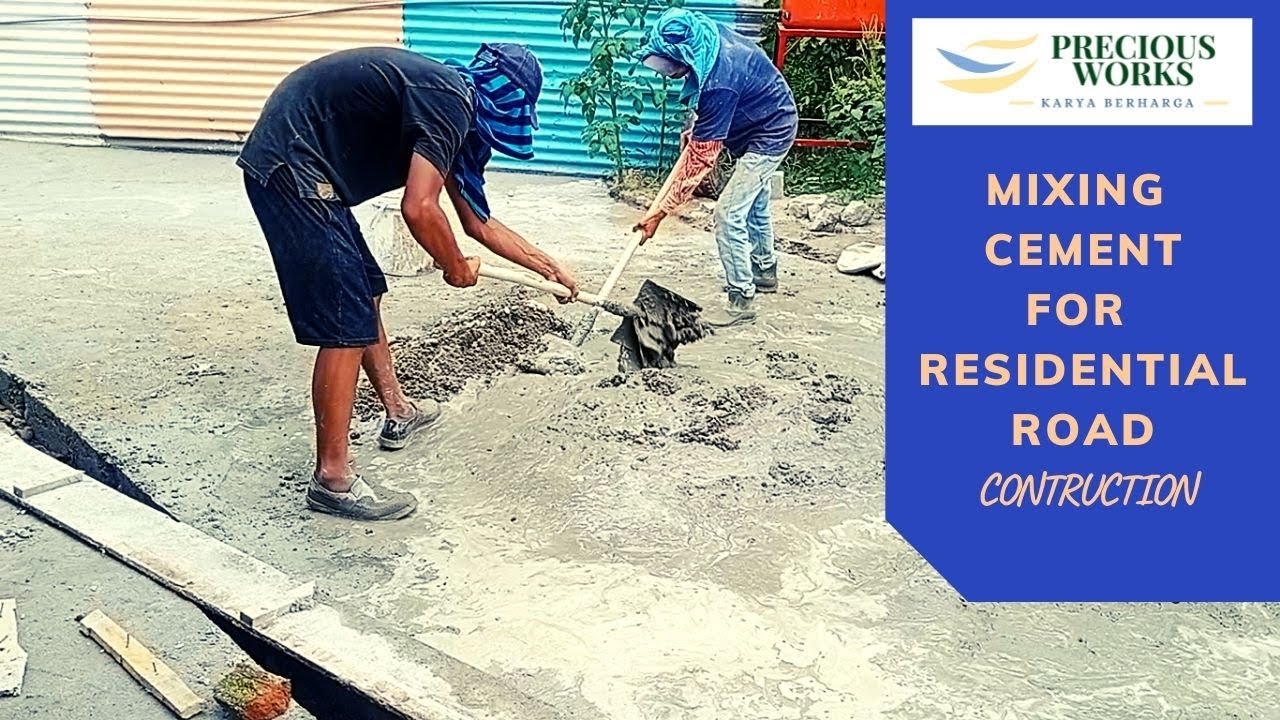 Mixing cement for residential road construction YouTube
