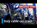 At least nine dead after cable car drops in the Italian Alps | DW News
