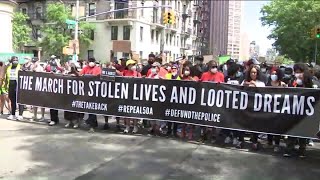 Protesters in Harlem rally, march against 'stolen lives and looted dreams'