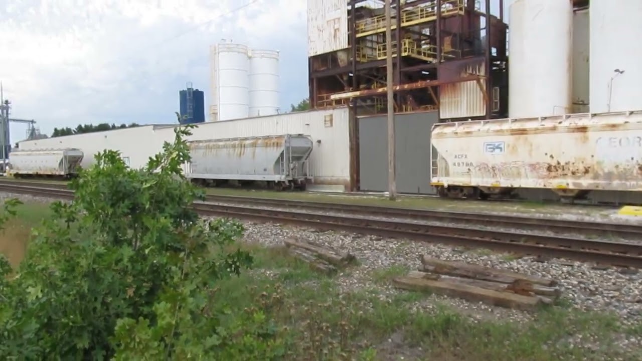 Wide angle of the HARBORLITE spur track with 4 ACF Center Flow covered hoppers near Vicksburg, MI