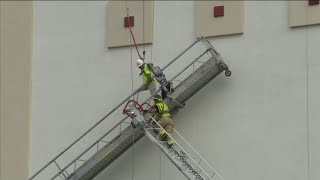 Firefighters rescue construction workers after scaffold accident