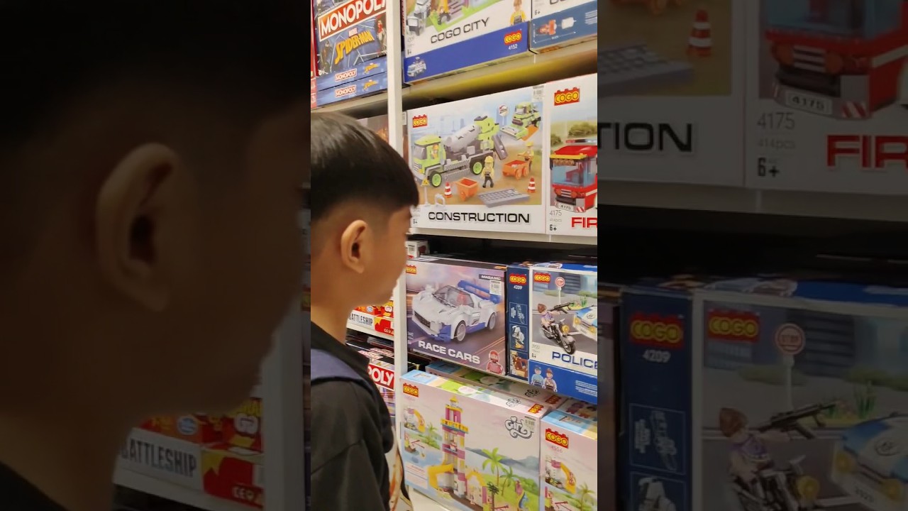 KYRIE ENJOY BUYING TWO COGO BLOCKS / LEGO POLICE CAR AND HELICOPTER 