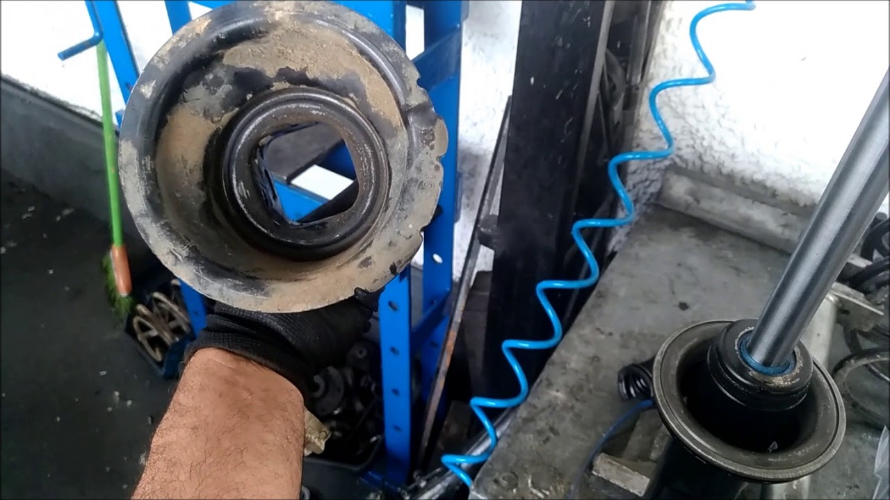 RENAUT SCENIC BATENTE DO AMORTECEDOR