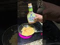 Making Scrambled Eggs With Cheese And Texas Bricken Seasoning Making Scrambled Eggs With Cheese And Texas Bricken Seasoning