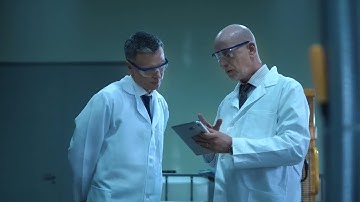 Scientists With A  Tablet Stock Video