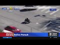 Moment motorcyclist fleeing LAPD at 130mph is killed in head-on crash on TV to the horror of newscaster describing the chase live