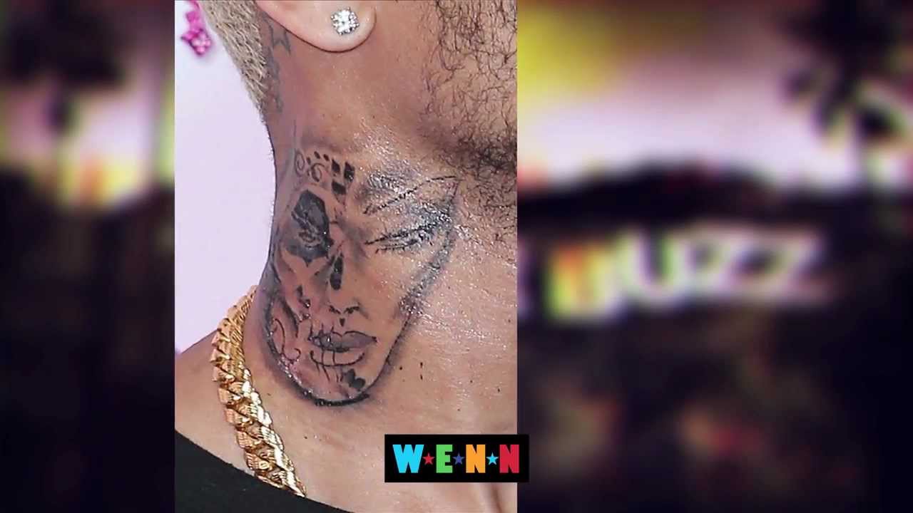 TMZ - Chris Brown's got a brand new neck tattoo... Look familiar? More:  http://tmz.me/QHCtvZ | Facebook