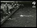 Johnny Weismuller sets new swimming record (1925)