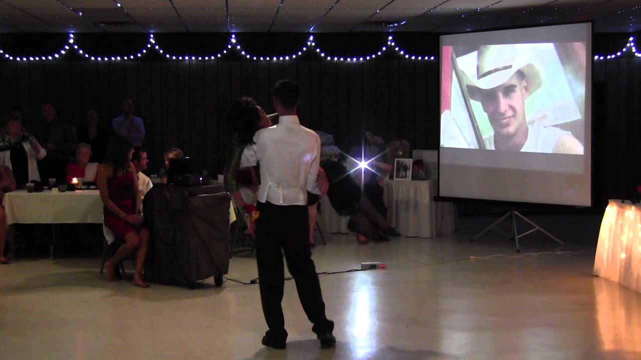 Surprised mom swept out of her wheelchair at son's wedding dance