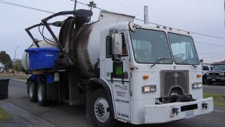 A 1997 Peterbilt 320 Impac CSL Working Late in Blythe