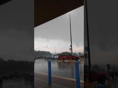 Front of walmart while tornado passes over me.
