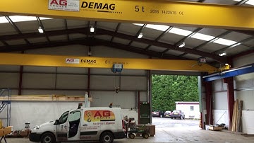 Crane Engineer wiring 2 DEMAG secondhand overhead cranes to be used for tandem lifting. Tested test