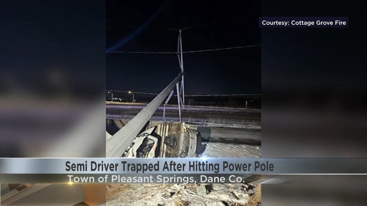 Semi driver stable after crash into power pole on I-90 - YouTube