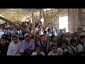 A song recitation by a small child of Sunrise Academy.