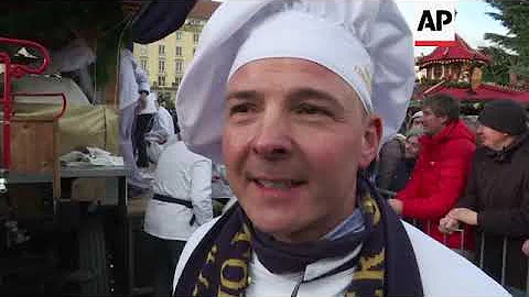Giant Christmas cake paraded through streets of Dresden