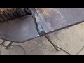 Welding the backhoe's foot