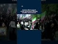 Iranians rally in support of their government following ceasefire announcement