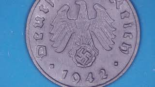 1 Reichspfennig, zinc coin from Germany, minted 1942 under the microscope