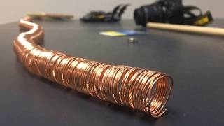 Simple Electric Train with Battery, Magnets, and a Coil.