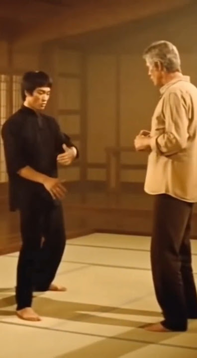 Bruce Lee teaching James Coburn Jeet Kune Do