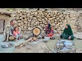Preparing breakfast for the family early in the morning in the nomads of Iran