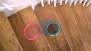 Giant slinky spring. Curved stairs.