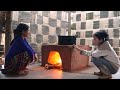 Mom and Ha made the clay stove themselves while Pao was away