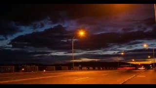 Traffic rush hour bridge at sunset - 4k timelapse