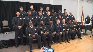 Badge pinning ceremony welcomes new officers to SPD