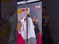 A masked guest just appeared on the TGMA red carpet #TGMA #27thTGMA