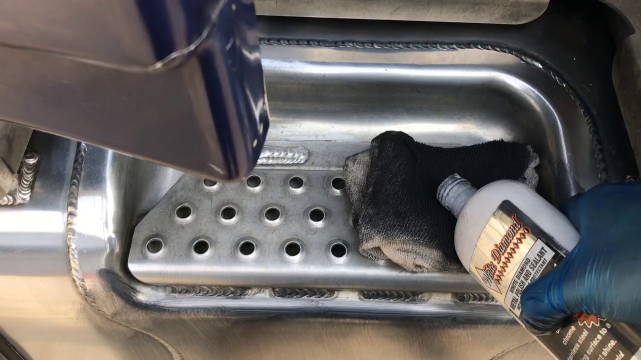 Second good go on my Fuel Tank with White Diamond metal polish using a cotton cloth to apply.