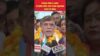 Congress leader Pawan Khera arrives at Delhi airport.
