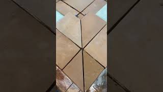 Zellige Tiles.  Tiling a shower floor and mitered curb