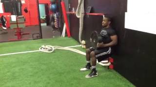 Wall Sit W Plate Raise