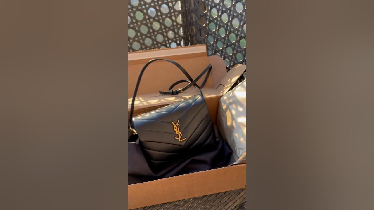 Saint Laurent Loulou toy bag review. Get a discount on Farfetch with