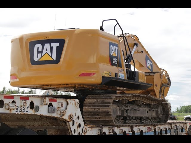トレーラー　CAT Loading up the brand new Cat 323 excavator - YouTube