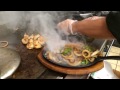 Casa De Nana Chef Bill Fett puts together their Sizzling Marinated Chicken Fajita