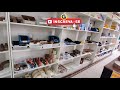 Guardando produtos da loja nas prateiras e no painel / loja material de construção