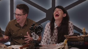 the intrepid heroes leering at minis (Dimension 20 Neverafter, Adventuring Party)
