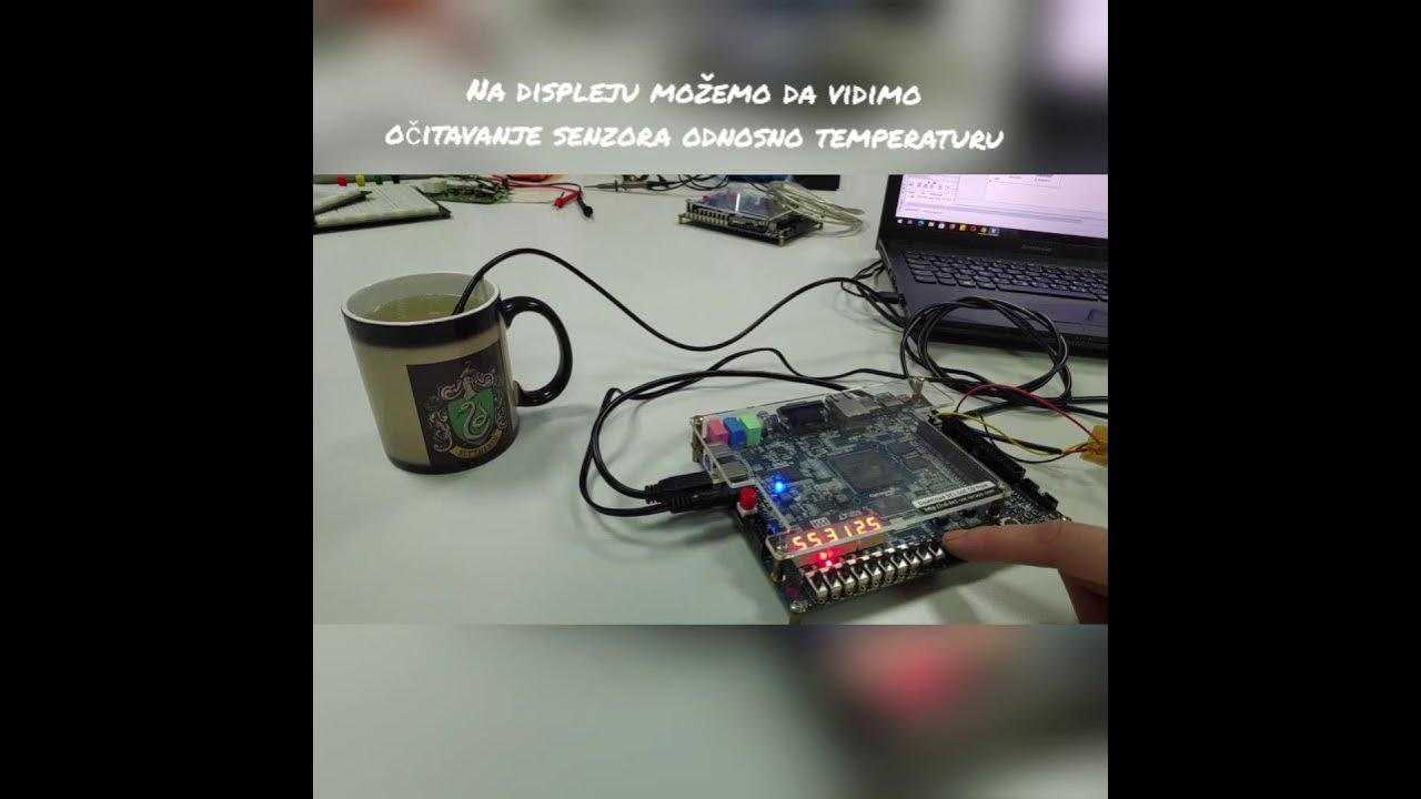 FPGAbased temperature monitor using DS18xx sensor described using VHDL