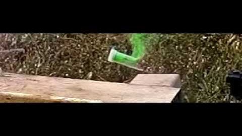 shooting paint can, shaving cream, glitter, silly string in slow motion