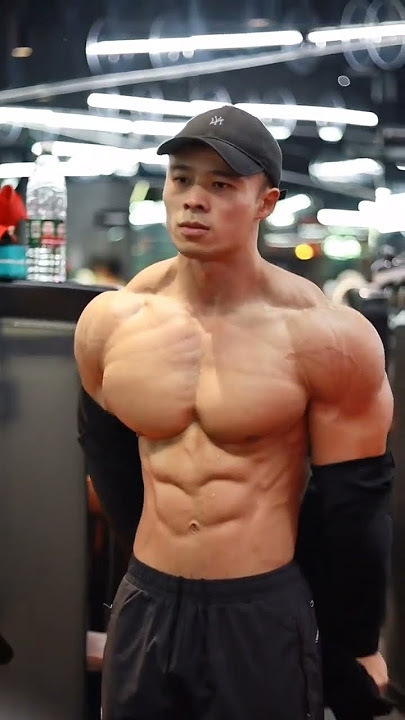 Asian guy showing off muscles 💪 #asian #muscle #sixpack