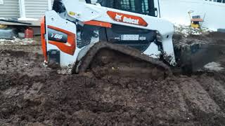 Bobcat T66 Working in Deep Mud