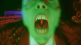 The Mask smashes animated alarm clock with a giant hammer. Scene The Mask 1994