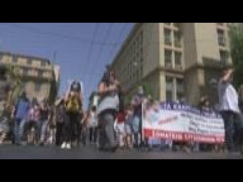 Greek health workers protest mandatory vaccines