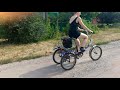 Трехколесный велосипед в действии