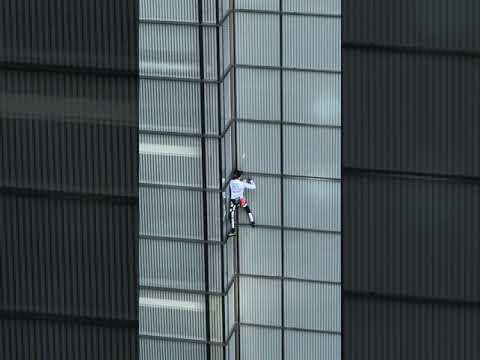 French (Alain Robert) Spiderman' climbs Heron Tower in the City of London 2018